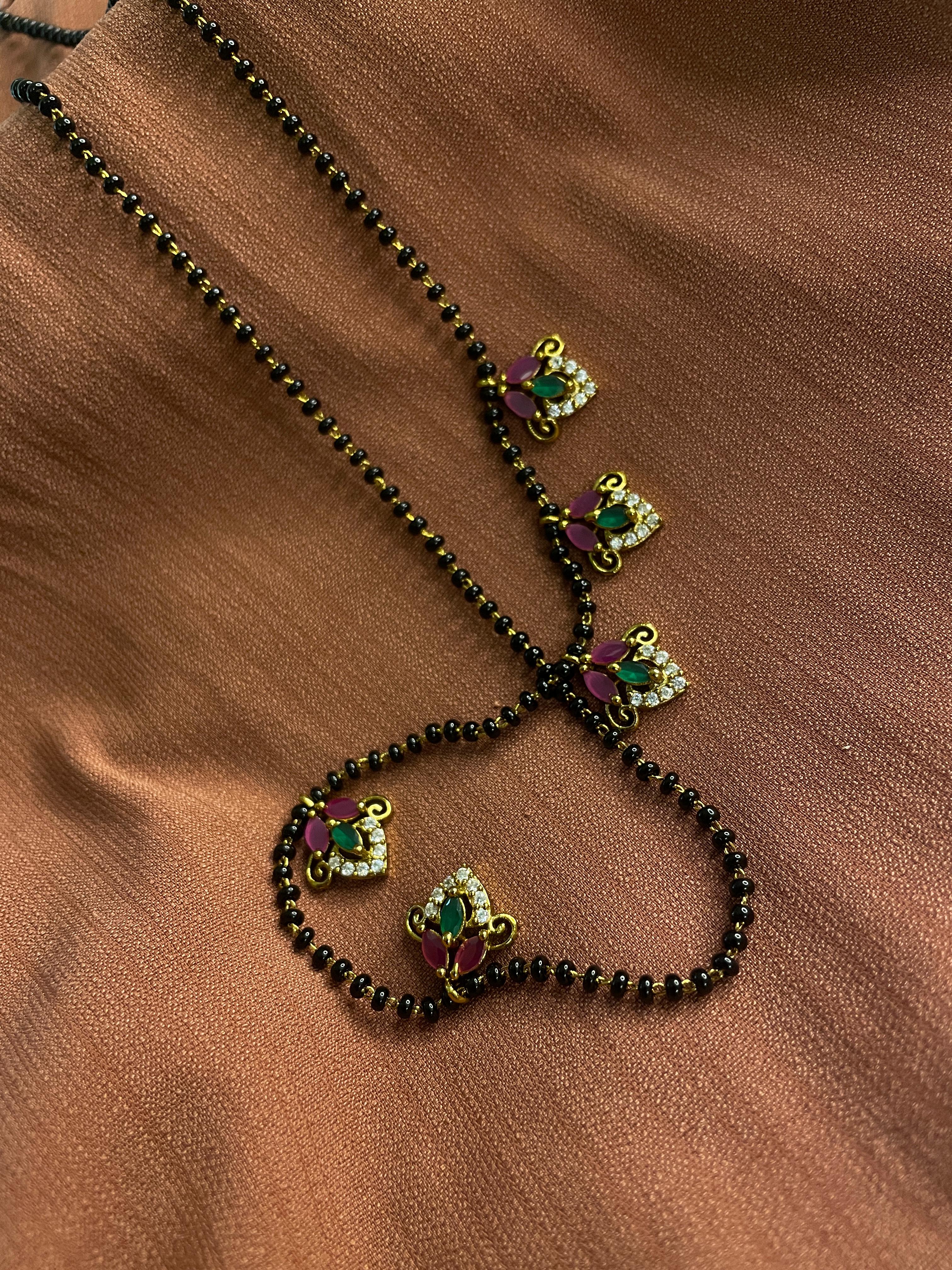 Karimani with ruby and green leaf set
